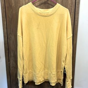 Pale yellow time and true sweater